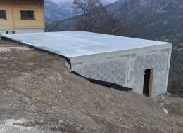 Socle en béton pour un chalet en bois