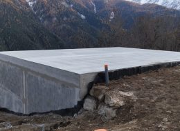 Socle en béton pour un chalet en bois